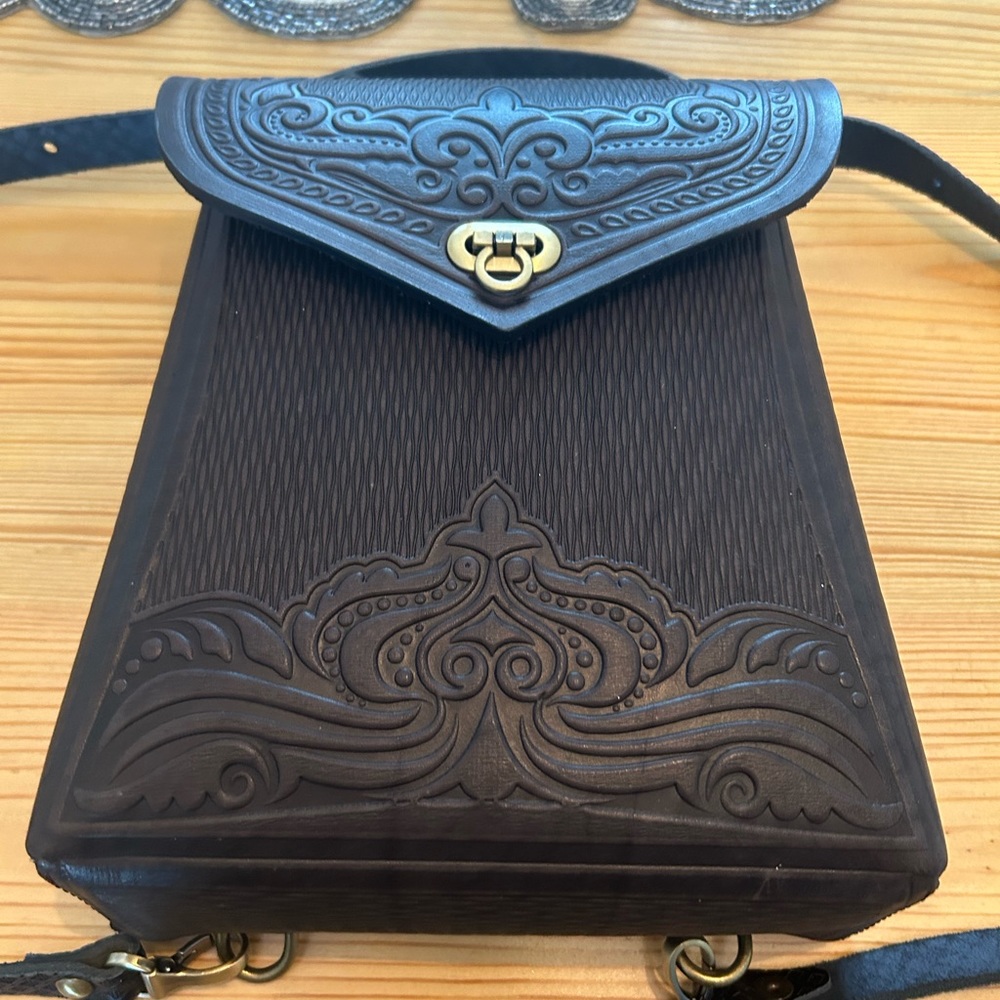 Brand new Custom made black leather back pack.